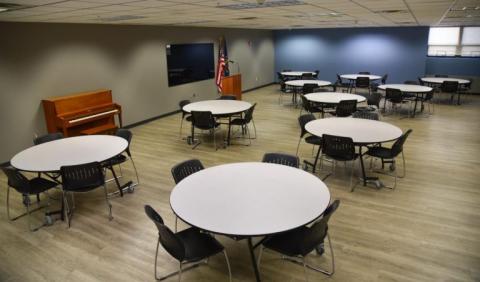 48 people max; Pictured: round tables and chairs